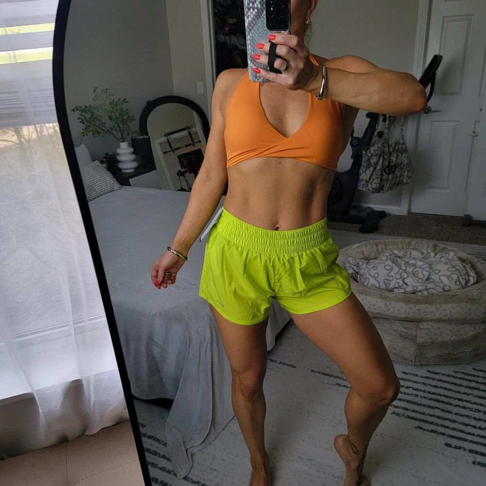 NWT NIKE dri-fit woman's running shorts in electric lime green